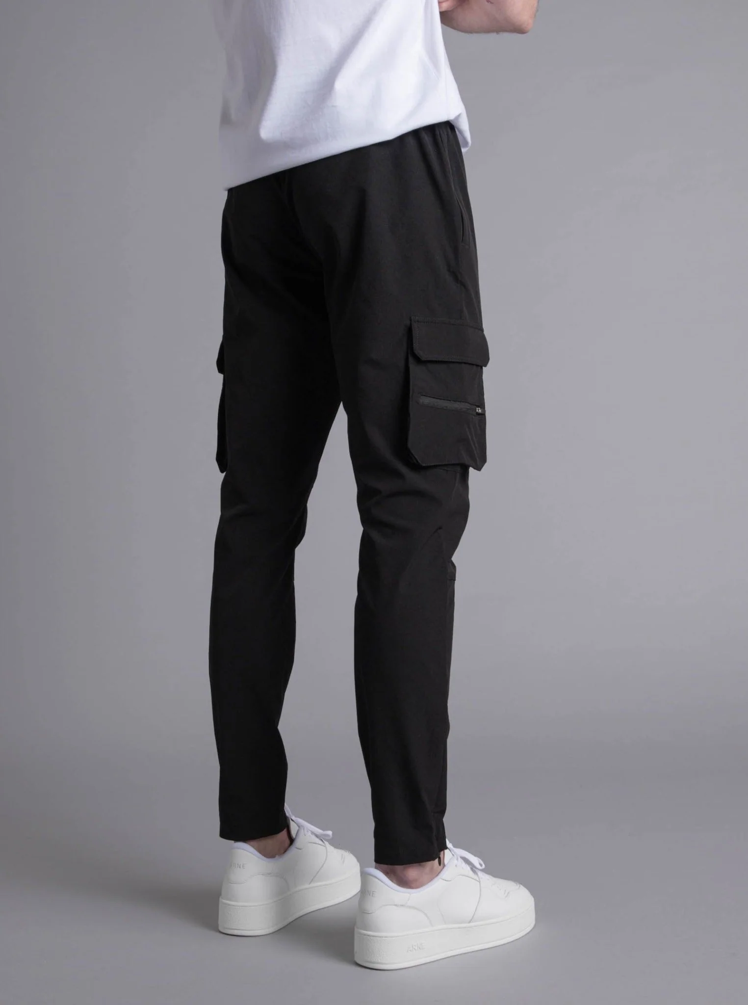 Tech Stretch Cargo Pant In Black - Image 11